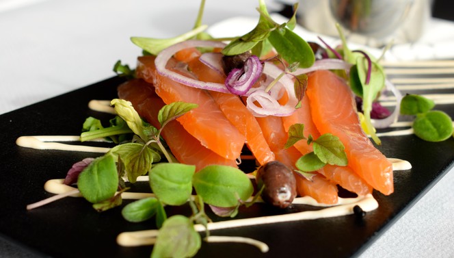 Salmon with red onion in restaurant Van der Valk Hotel Veenendaal