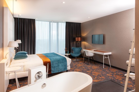 Slaapkamer en badkamer Superior Hotelkamer Hotel Veenendaal